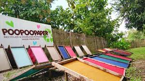 Colorful paper drying in the sun.